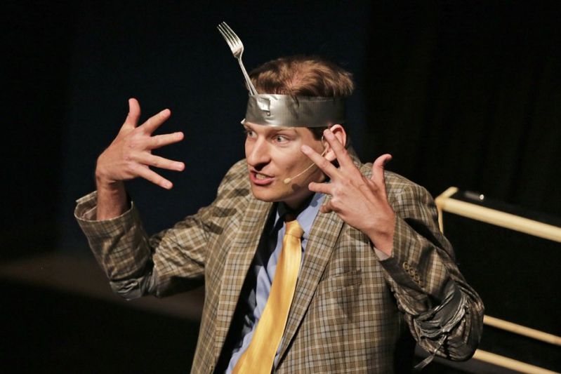 Ryan Pilling performing a banquet magic show